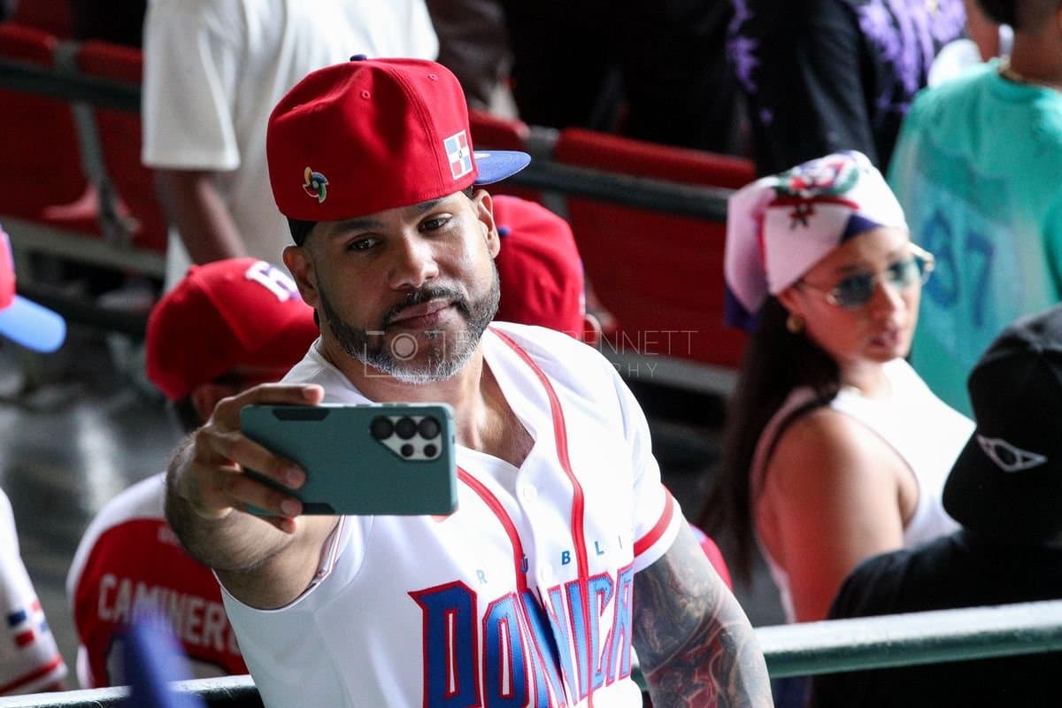 SANTO DOMINGO, DOMINICAN REPUBLIC - MARCH 04: A fan takes a photo during an exhibition game between the Detroit Tigers and the Dominican Republic at Estadio Quisqueya on March 04, 2026 in Santo Domingo, Dominican Republic. (Photo by Bryan Bennett/Getty Images)