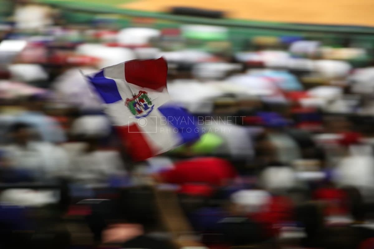 SANTO DOMINGO, DOMINICAN REPUBLIC - MARCH 03: A fan waves a Dominican Republic flag during an exhibition game between the Detroit Tigers and the Dominican Republic at Estadio Quisqueya on March 03, 2026 in Santo Domingo, Dominican Republic. (Photo by Bryan Bennett/Getty Images)